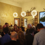 Inside the tasting room, “Diana’s Lair,” where guests gathered for cocktails prepared by Brian Mitchell, seen behind the bar.