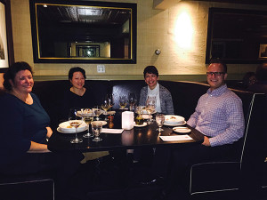 Jonathan Wadman (right) with guests at Cafe Routier.