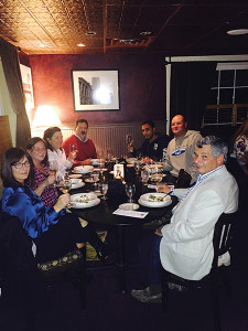 George Carabetta of Cellar Fine Wines (right) and Westbrook Package Store Manager Nimesh Sagar (third from right) with guests at the Phelps Creek Wine dinner.