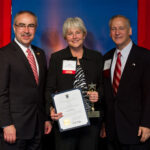 Adrian Bonéy received the Education Ambassador of the Year award for promoting the importance of adult education and workforce development skills throughout Rhode Island. Left to right Chairman of the National Restaurant Association