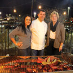 Owners Mira Puka and Chef Dorjan Puka celebrating with Mindy Rosenberg from Hartley & Parker, Ltd.