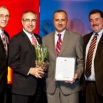 Bahjat Shariff accepts his National Restaurant Association Faces of Diversity Award. Left to right Incoming RIHA Chairman of the Board, Angelo DePeri; Chairman of the National Restaurant Association, Xavier Teixido; Operating Partner