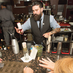 Dimitrios Zahariadis in July 2015 during a guest stint at The Revolving Door in Newport, Rhode Island. Photo by Chris Almeida.