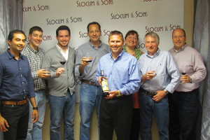 Dan Campbell, New England Regional Manager, Wagner Family of Wine (holding the bottle) and Slocum & Sons sales representatives.