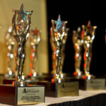 Custom-made star trophies line the award table at the 2012 RI Hospitality Association’s Stars of the Industry event held at the Rhode Island Convention Center.
