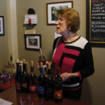 Claire Berntson pours in the tasting room.