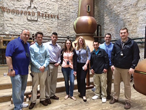 Shown at the Woodford Reserve Distillery in Louisville, the group is shown in front of one of three stills. Dom Borghese, Brendon Mahony, Sebastian Cummings, Jennifer Caulfield, Donna Schweder, Tony Vincent, Chris Ferraro and Tom M. Ehrler. 