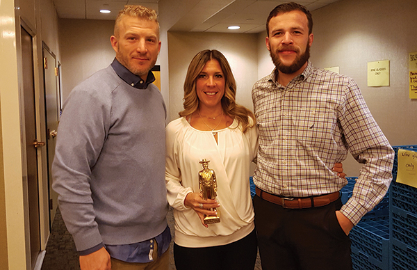 All of Eder Bros., Inc.: Jason Miller, Brown-Forman Wine Portfolio Winner; Nancy Peduto, Brown-Forman On-Premise Representative of the Year, holding a 2016 Golden Jack statuette; and Vin Rossetti, Brown-Forman Tequila Portfolio Winner.