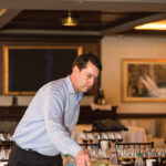 Nay Saywell, Fine Wine Manager, MS Walker pours.