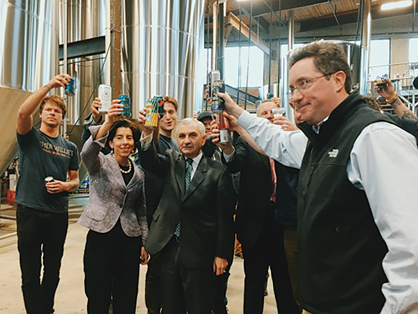 Nico Enriquez, Co-founder, Farmer Willie’s Craft Ginger Beer; Gov. Gina Raimondo; Max Easton, Co-founder, Farmer Willie’s Craft Ginger Beer; Jack Reed, RI State Senator; Mayor Donald Grebien of Pawtucket; Jeremy Duffy, Co-founder and Managing Partner, Isle Brewers Guild, having a “cheers” to the new opening of Isle Brewers Guild. 