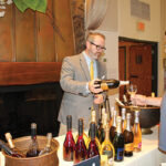 Ed Dunn of Brescome Barton pouring a taste of Ruffino Prosecco for a trade guest.