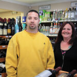 Owner Anthony Lewis and store employee Jess Tilley.