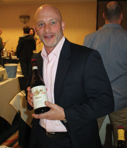 Wally Crumb, CFO, Slocum & Sons with a Vietti Barolo wine.