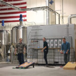 CRA members practicing for the cornhole tournament.