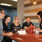 Allison Rodia of Waypoint Spirits conducting a tasting for Miguel Proano, Carlina Fontaine, Jeannie Venditto and Steve Balicki, all from Buffalo Wild Wings.