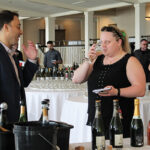 Carl Vitale, Divisional Manager South, Winebow showcasing sparkling selections to Betty Swietak, BevMax.
