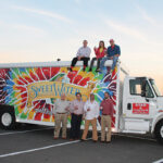 On top of truck: Peter Gallo, Vice President, Star Distributors; Lindsay Bryan, Market Development Manager-NYC, SweetWater Brewing Co.; Chaz Chassner, Director of New Market Development, SweetWater Brewing Co.; On ground: Anthony Gallo, President and CEO, Star Distributors; Mark Mattei, Vice President of Sales, Star Distributors; Steve Farace of SweetWater Brewing Co.; Rocky Gallo, Vice President, A. Gallo and Company.
