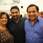 All of Oxford Liquors in Manchester: Nilaxi Patel, Co-Owner; Paresh Vinchhi, Employee; Rash Patel, Co-owner.
