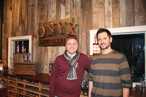 “40 Under Forty” award recipient, Onyx Spirits Company’s Adam von Gootkin with co-owner Pete Kowalczyk, at the 2015 opening of their distillery’s tasting room in East Hartford.
