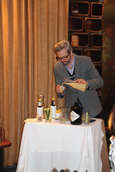 Ryan mixing the first Hendrick’s Gin cocktail with cucumber and lemonade.