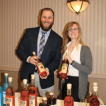 David Mensch and Alycia Sandmeier, Sales Representatives, Slocum & Sons with High West Whiskey.