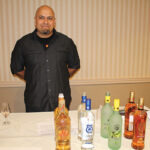 Efrain Vezquez, Merchandising, Slocum & Sons with Defiant Whisky and Don Q Rum.