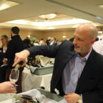 Wally Crumb, CFO, Slocum & Sons pouring.