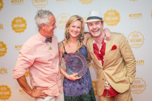 Jason Crawley (left), Brooke Arthur, and Philip Duff (right) celebrate Brooke's distinction as Best American Brand Ambassador at the 2015 Tales of the Cocktail Spirited Awards at the Sheraton Hotel in New Orleans on July 18, 2015.