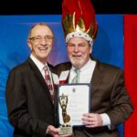 Mark Gervais, General Manager of The Hotel Viking, receives the Man of the Year Award. Left to right Incoming RIHA Chairman of the Board, Angelo DePeri; and Mark Gervais