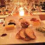 Milk & Honey cheese platters sampling with Newport Vineyards wines in the background.