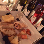 Milk & Honey cheese platters sampling with Newport Vineyards wines in the background.