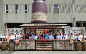 Leigh Ann Lengyel, Regional Sales Manager of Ole Smoky Distillery (center left, first row), kicked off Ole Smoky Moonshine's Lightnin’ line with the Hartley & Parker sales force.
