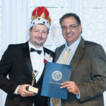 Man of the Year Norman L. LeBlanc, CPA, from Kahn, Litwin, Renza & Co., Ltd. with Sculos.