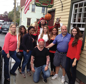 Back: Morganettes Ashley Edwards and Kalie Baluzy with Captain Morgan. In front left to right: Kari Weber, Diageo; Corinn Williams, Distributor Manager, Diageo; Shanya Weinrauch, Bartender, Harp & Hound; Jen Dixon, Morganette; Doug Preston, District Manager, Hartley & Parker; Autumn Barton, Diageo. Kneeling: Leo Roche, Owner, Harp & Hound.