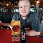 Frank DelGreco, General Manager, Local Kitchen & Beer Bar, with 5X Better, an Italian red blend.