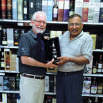Ralph Rooke, Manager, Whyte & Mackay and Raj Modi, Owner, World of Beverages.