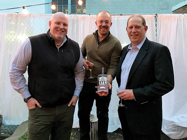 John Slocum, Executive Vice President and General Manager; Alex Meier-Tomkins, Boutique and Craft Brands Director, Slocum & Sons; Tom Schlachtenhaufen, Executive Vice President of Sales, Sagamore Spirit.