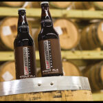 The Barrel Aged Uprising Stout Ale is aged in Uprising Single Malt Whiskey oak barrels, 9.97% ABV.