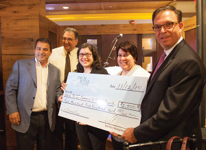 Fred Forsley, Proprietor, Shipyard; Craig Sculos, Vice President and General Manager, Twin River Casino; Kelly Seig, Volunteer and Special Events Manager, RI Community Food Bank;  Doris Moore, Grants Manager, RI Community Food Bank; and John Taylor, Jr., Chairman, Twin River Casino.