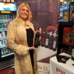 A Gabel’s customer and wine enthusiast visiting the Piu Facile wines display.