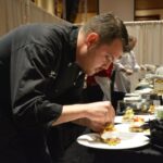 Winning chef Jeffrey Hoit working on a dish.