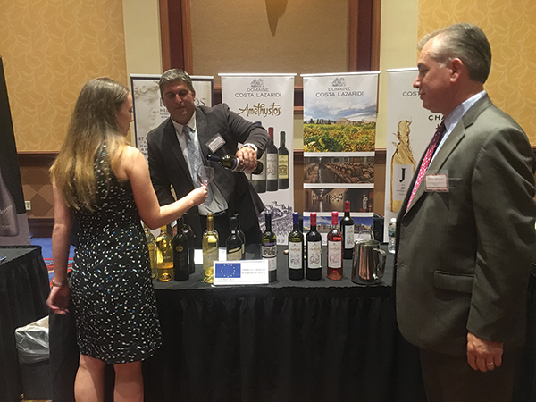 Peter Ioannou of Nestor Imports sampling the Greek wine portfolio with Erica Lass.