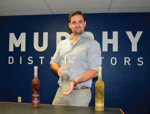 PunZoné family of vodkas includes PunZoné Italian Organic Vodka 80 proof, which is handcrafted in a five-column distillation system from Italian wheat grown in Piedmont, Italy and blended with pure water from the Italian Alps. PunZoné’s blended vodkas are available in PunZoné Blood Orange Originale and PunZoné Lemoncino. Matthew Murphy, President of Murphy Distributors, shown with PunZoné Organic Italian Vodka.