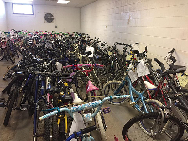 Project Broken Wheel volunteers prepared bikes for the upcoming holiday drive.