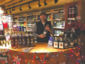 Saxtons River Distillery’s Marketing Manager Drew Kacik at Stew Leonard's in Newington.