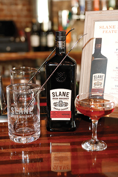 Slane Irish Whiskey is golden in color with complex fruit, caramel, brown spice and toasted oak on the nose. The taste is “spicy at first, then sweetened with vanilla and butterscotch with lingering hints of dry fruit and caramelized sugar on the finish.”