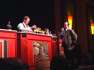 Frank Martucci, General Manager Beverage Operations, Twin River Casino and National Executive Vice President United States Bartenders Guild officiated as Silas Axtell delivered the win.